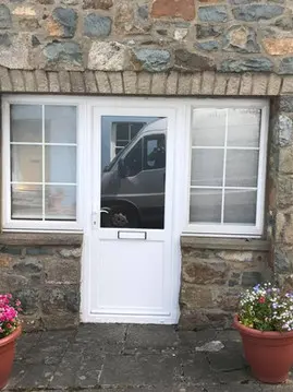 Stone cottage door and windows after repair by Pembrokeshire Window Medic
